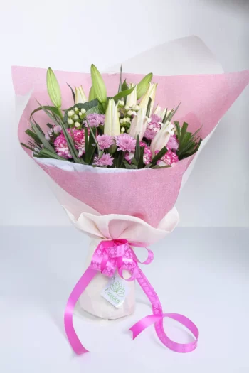 Hand Bunches Oriental Lily, Hypercium Berry, Carnations & Brassica