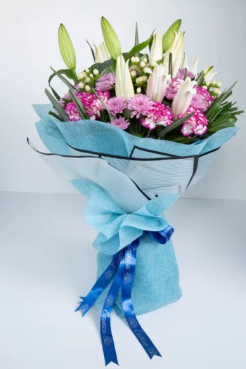 Hand Bunches Berry, Brassica, Daisy, Carnations & Oriental Lily