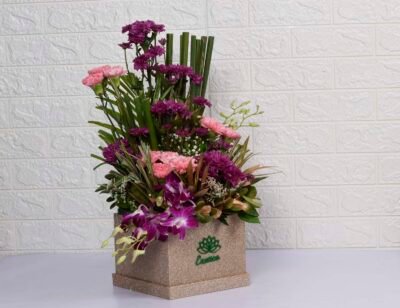 Box Arrangements Box flower arrangement of purple Daisy & Carnation