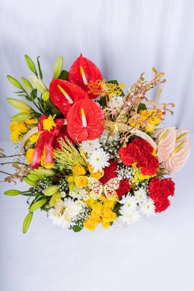 Basket Arrangements Flower Arrangement Of Yellow Roses, Red Carnation With Red Anthurium