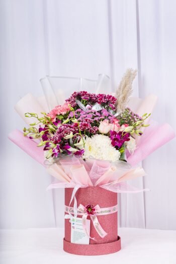 Box Arrangements Flower Arrangement Of  Light Pink  Carnation, Purple Orchids With Chrisanrtimam