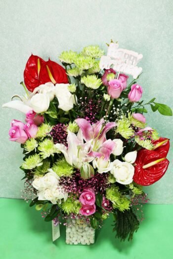 Fresh Flowers Flower Arrangement of Red Anthurium & White Roses With Lily