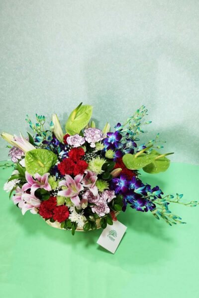 Basket Arrangements Basket Arrangement Of Red Roses & Green Anthurium with Blue Orchids